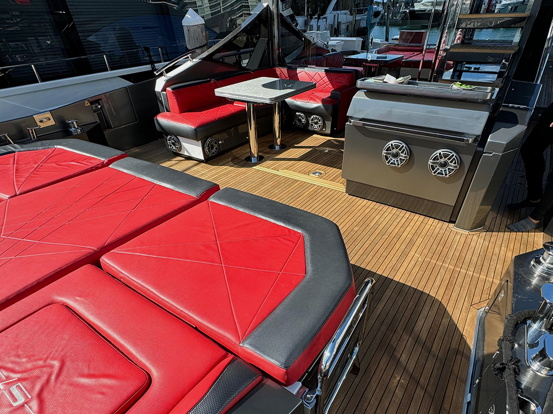 Boat custom made red upholstery with signature, service by Marine Wraps in Miami